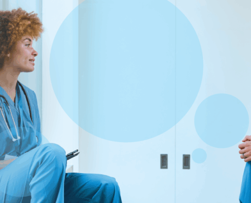 nurses speaking to one another