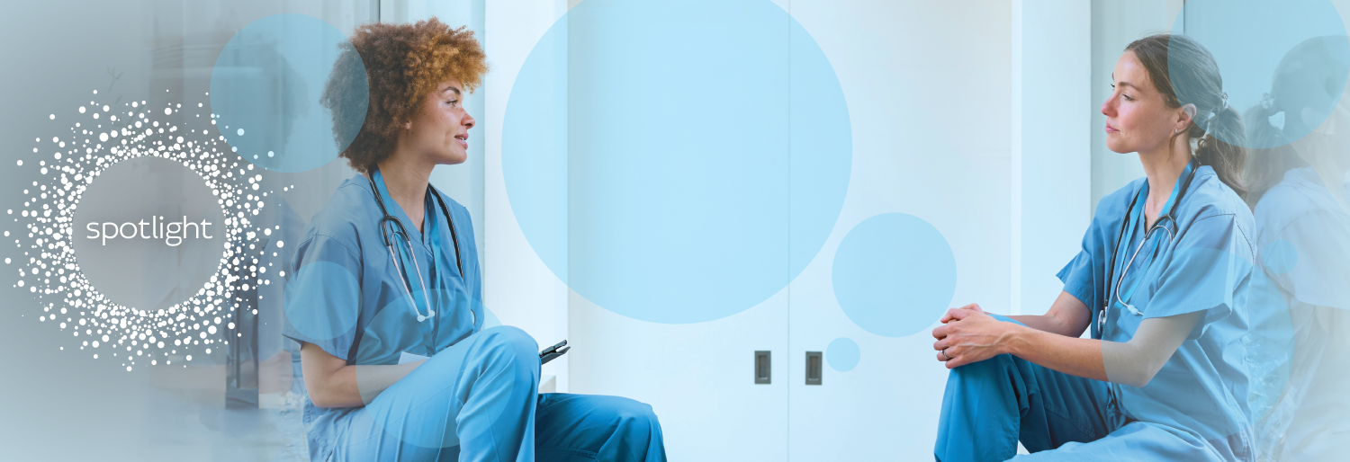nurses speaking to one another