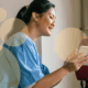 nurse helping patient