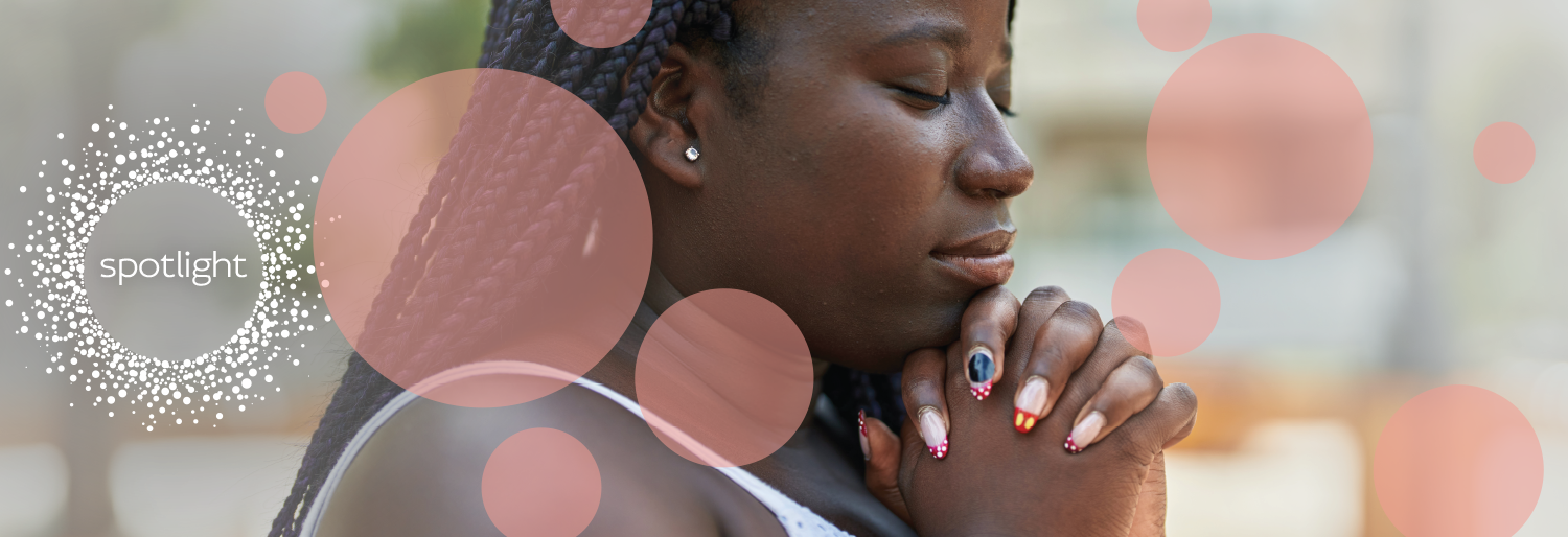 black woman praying