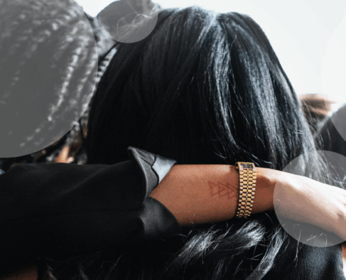 women hugging