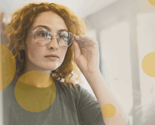woman looking in mirror
