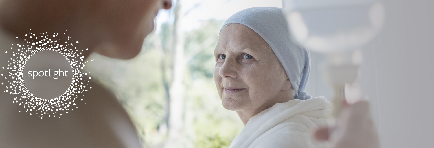 woman smiling though unwell