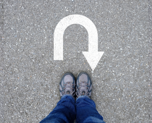U-turn on a gravel background